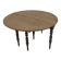 Half-moon extendable oak table for 2 to 8 people.