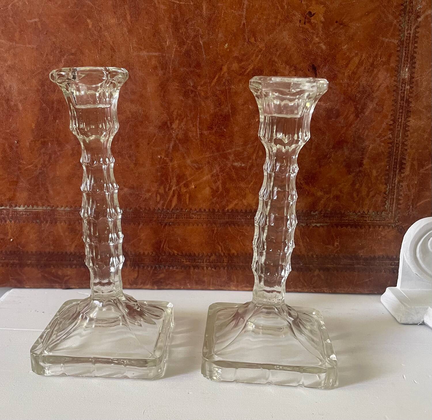 Pair of molded glass candlesticks