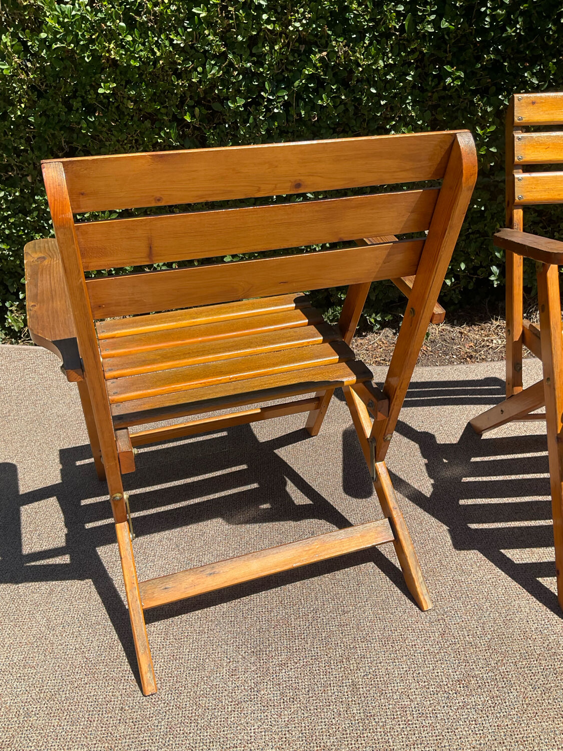 Pair of vintage wooden folding armchairs