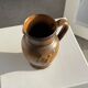 Speckled stoneware jug with grape pattern H17