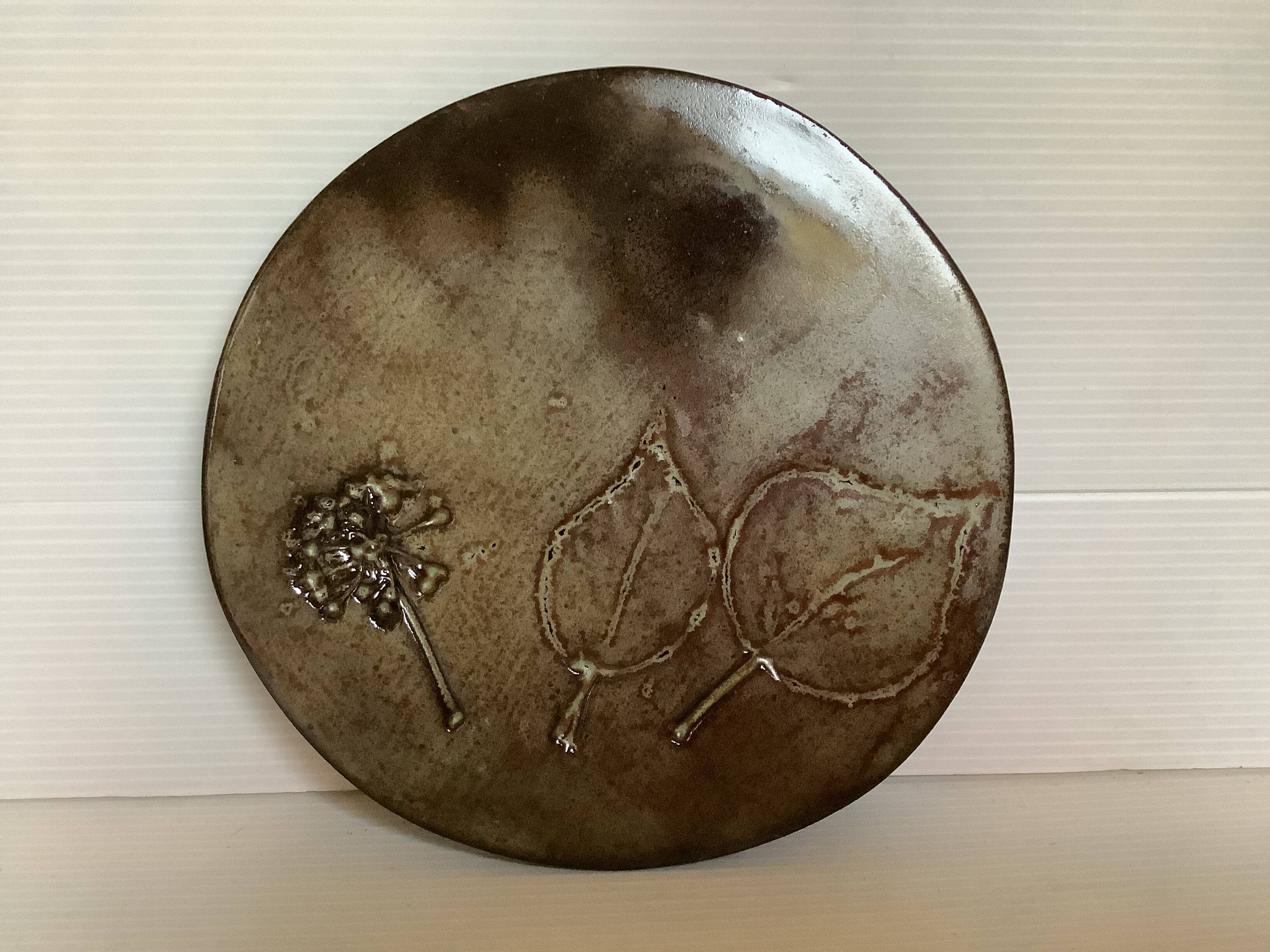 Brown ceramic trivet