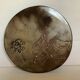 Brown ceramic trivet