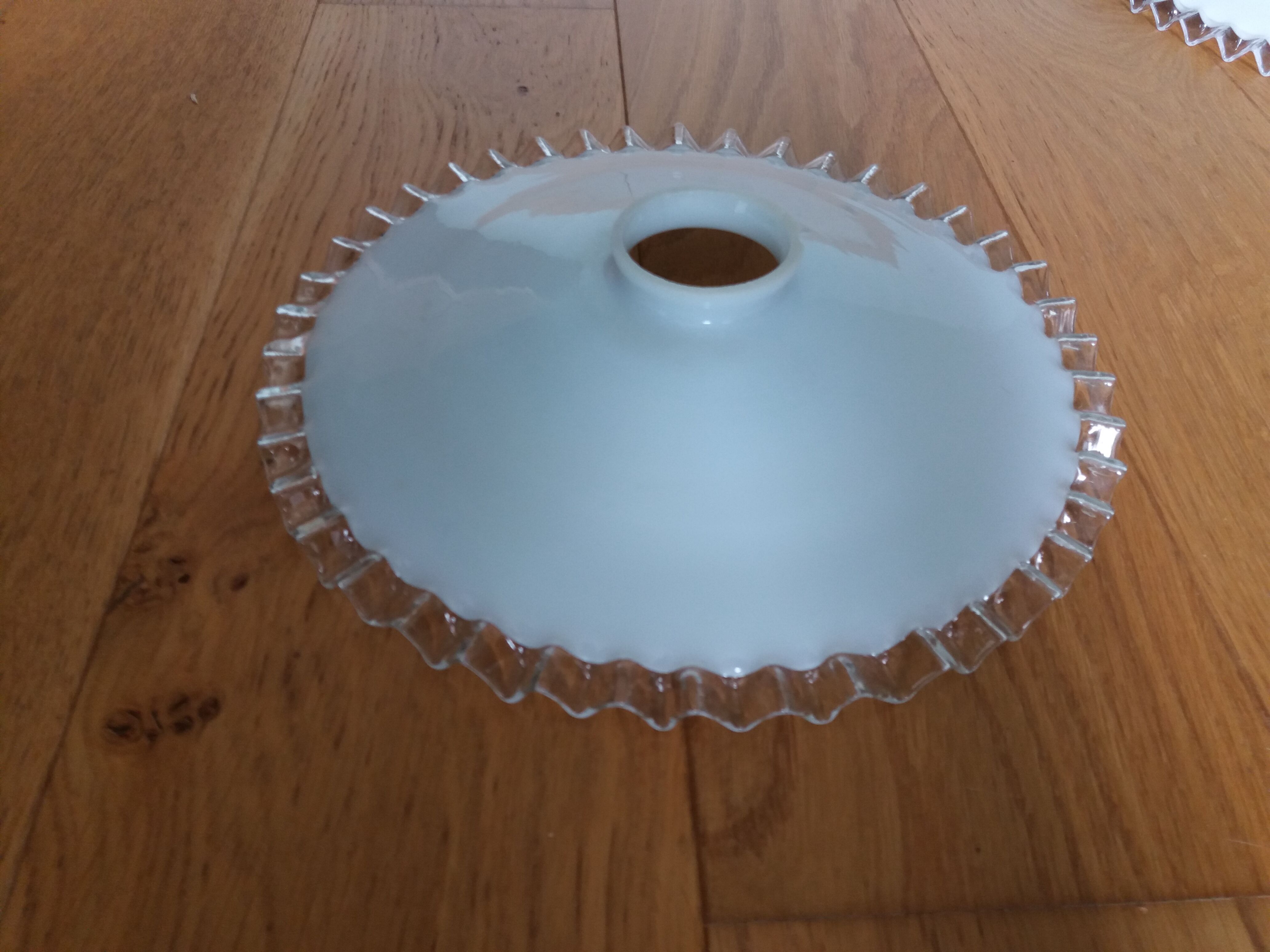 White opaline daylight and transparent wavy edge