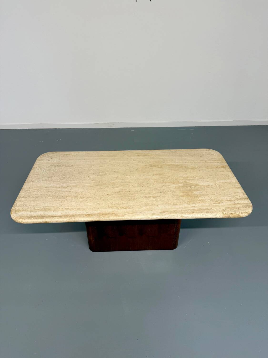 Travertine coffee table with wooden legs, Italian design from the 1970s, vintage.