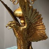 Large lamp with a bronze eagle figure.