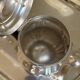 Ercuis 5-piece tea and coffee service in silver-plated metal.