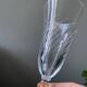 2 antique blown glass champagne flutes, tulip shape.