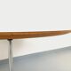 Vintage Eames round table for Vitra in white melamine, wood, and metal.