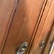 Antique carved wooden dressing table with marble and tilting oval mirror.