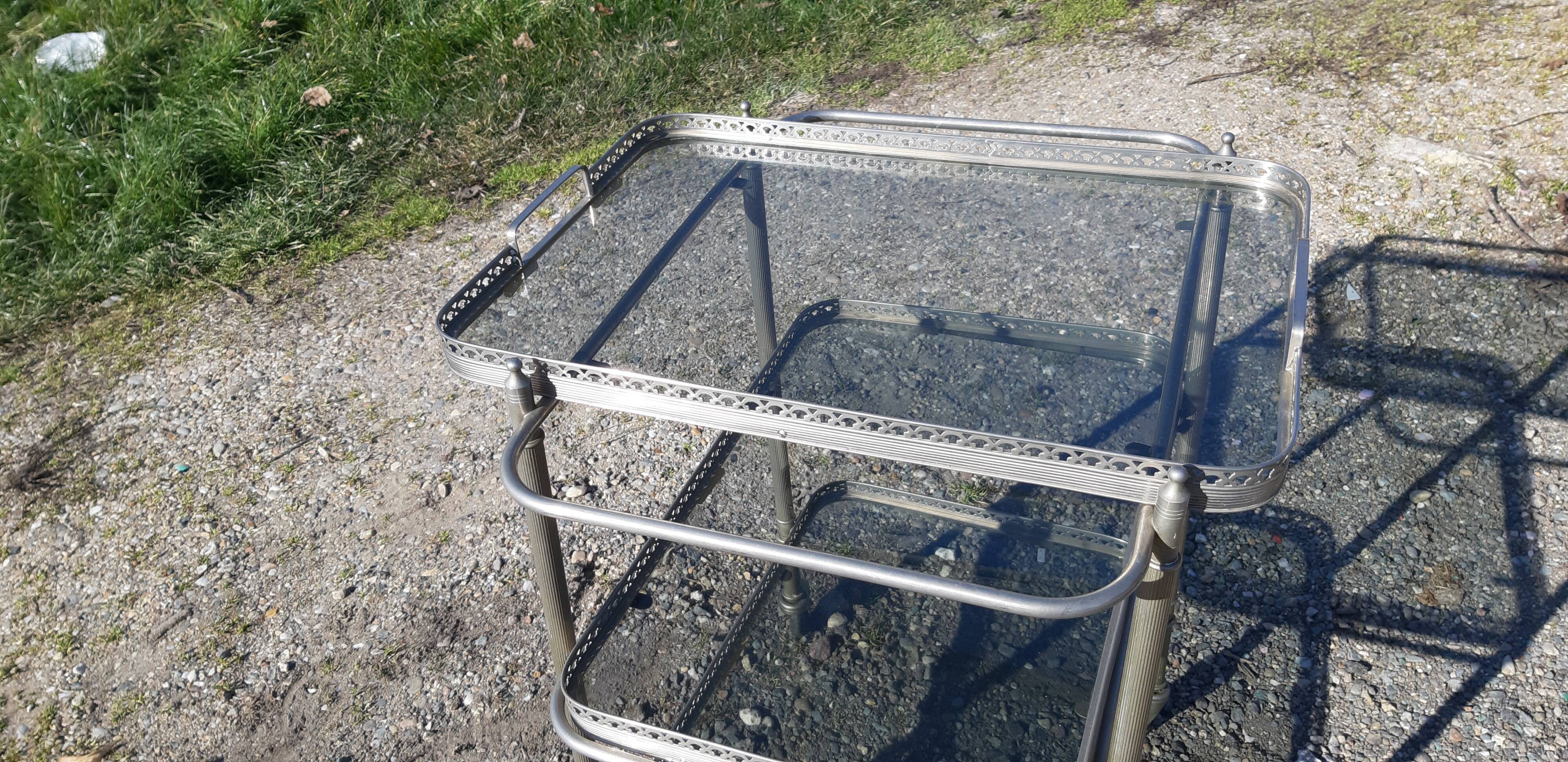 Rolling service silver metal and bluish glass