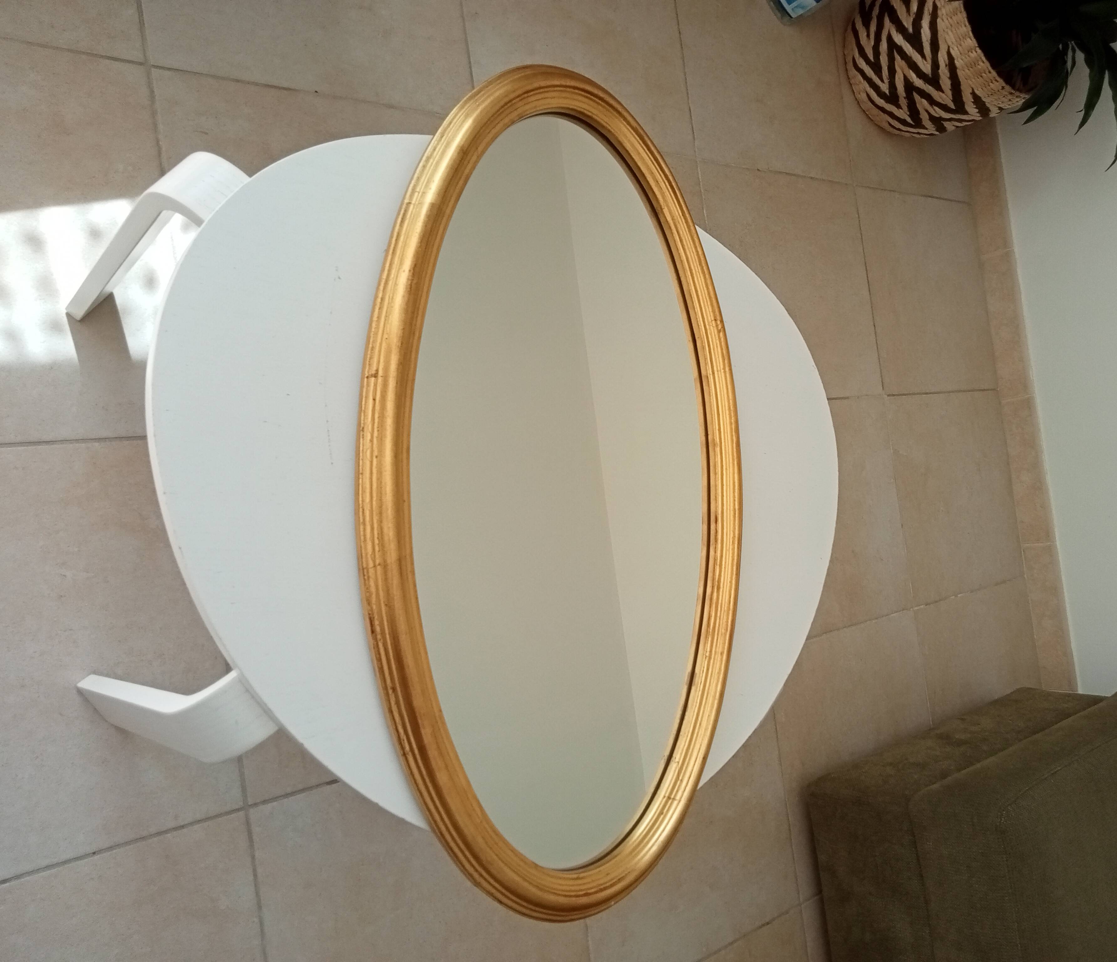 Miroir vintage ovale en bois doré années 60 77*41 cm