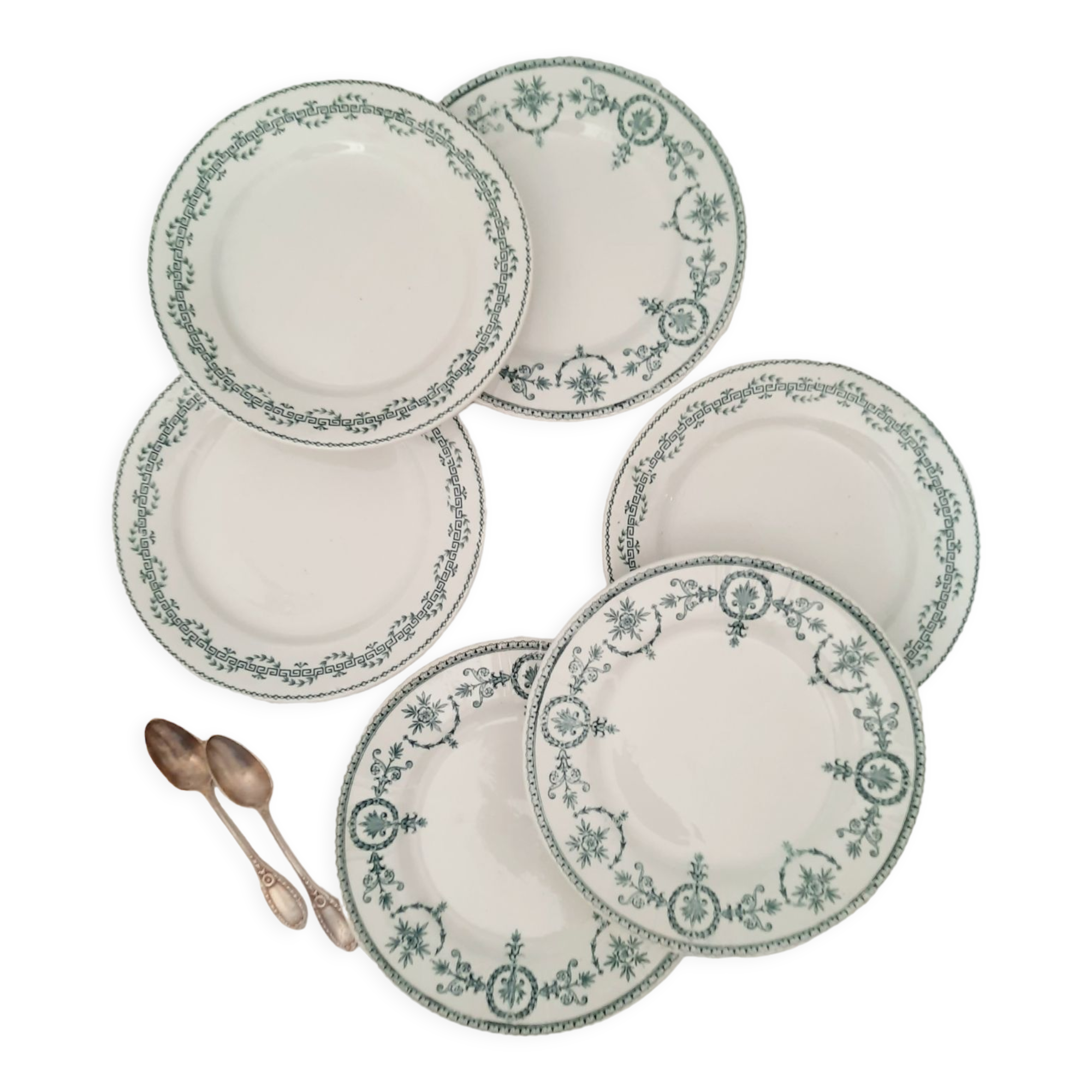 Old dessert plates mismatched in iron earth