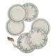 Old dessert plates mismatched in iron earth