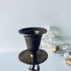 Twisted brass candle holder