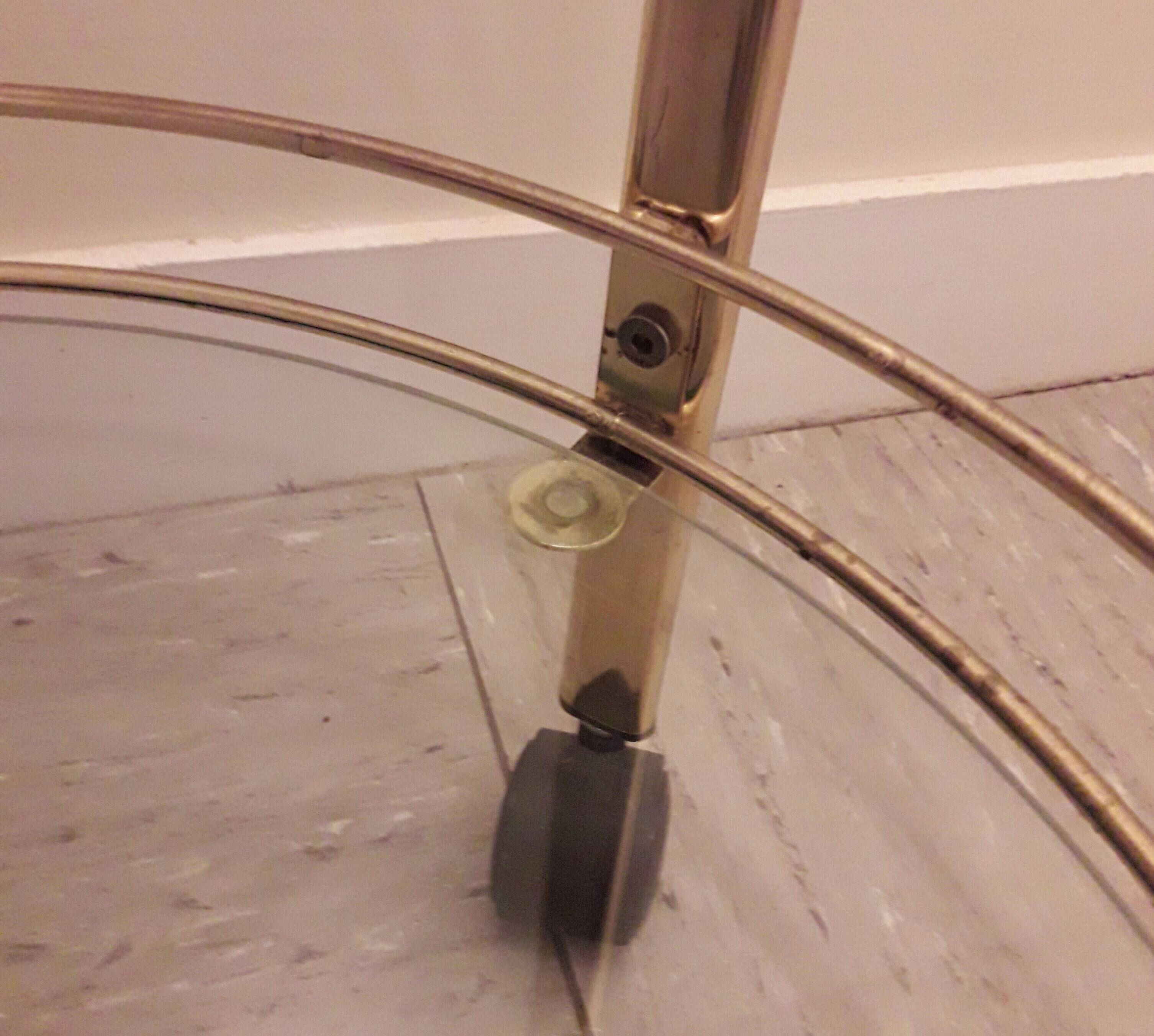 Rolling service in gilded metal and glass