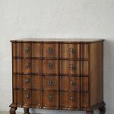 Antique baroque oak commode from the late 18th century with cabriole legs.