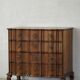 Antique baroque oak commode from the late 18th century with cabriole legs.