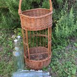 Braided wicker bottle rack