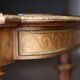Superb Napoleon III table. Marquetry top and gilded bronzes.