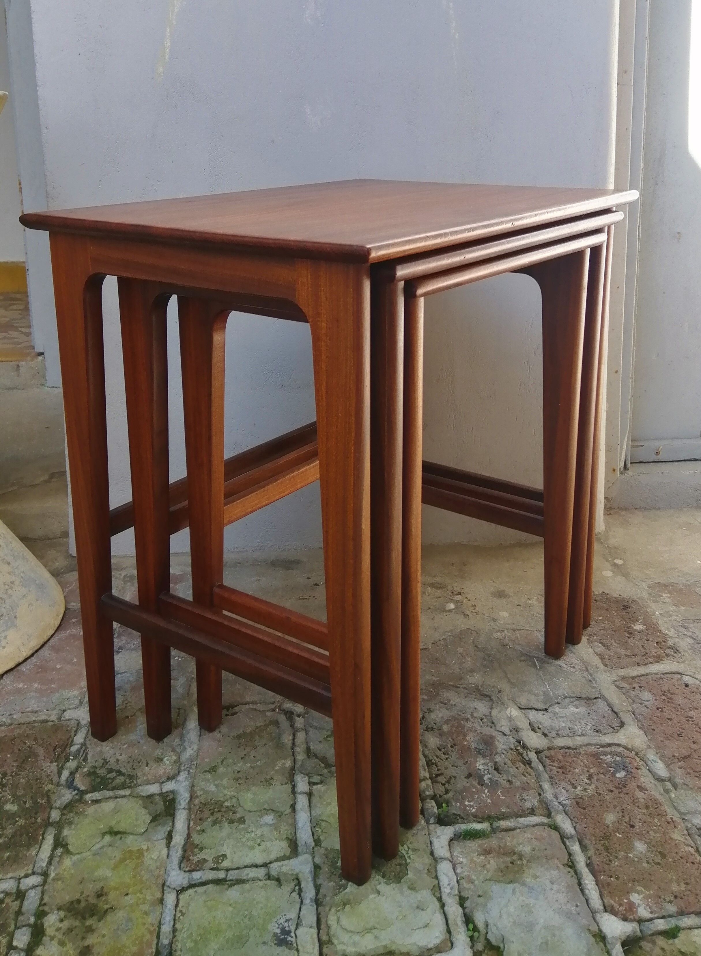 Pull-out tables from the 60s in solid exotic wood published by Younger