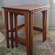 Pull-out tables from the 60s in solid exotic wood published by Younger