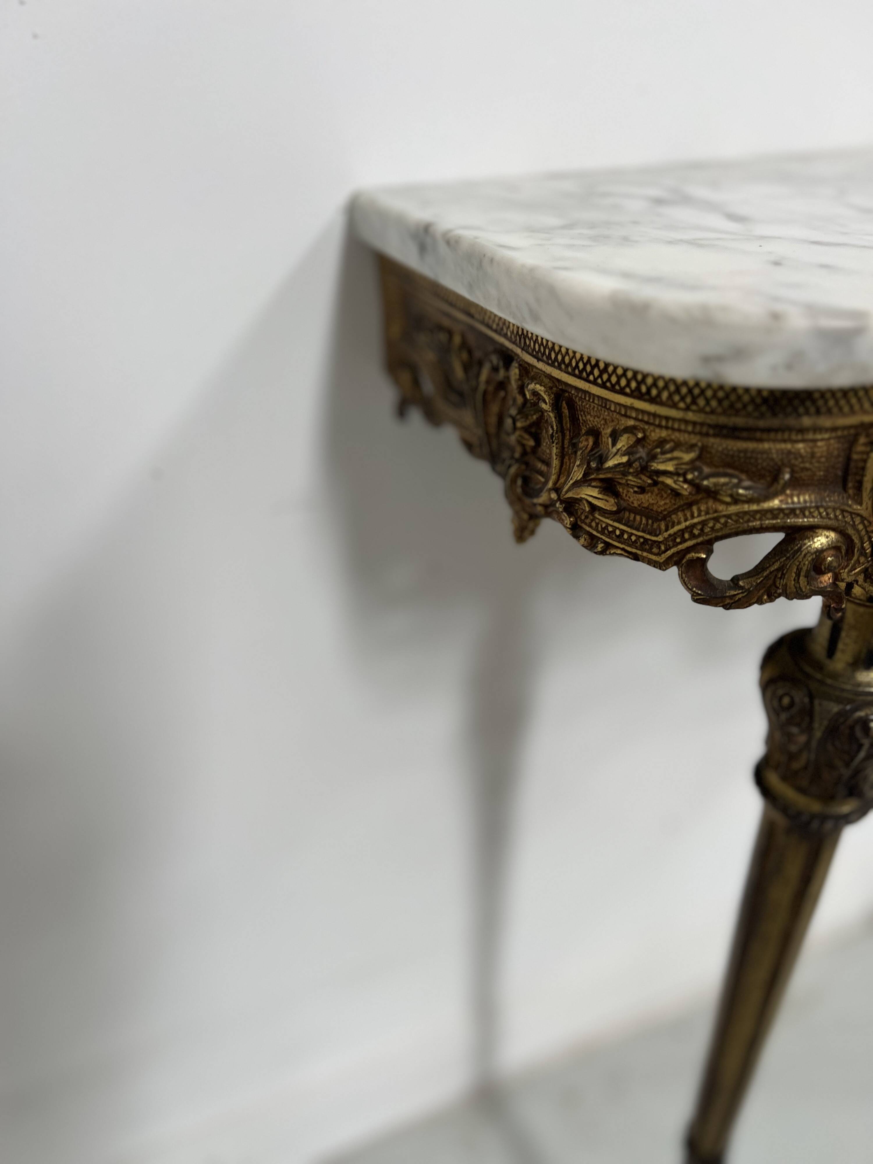 Louis XVI style console in gilded bronze, 20th century