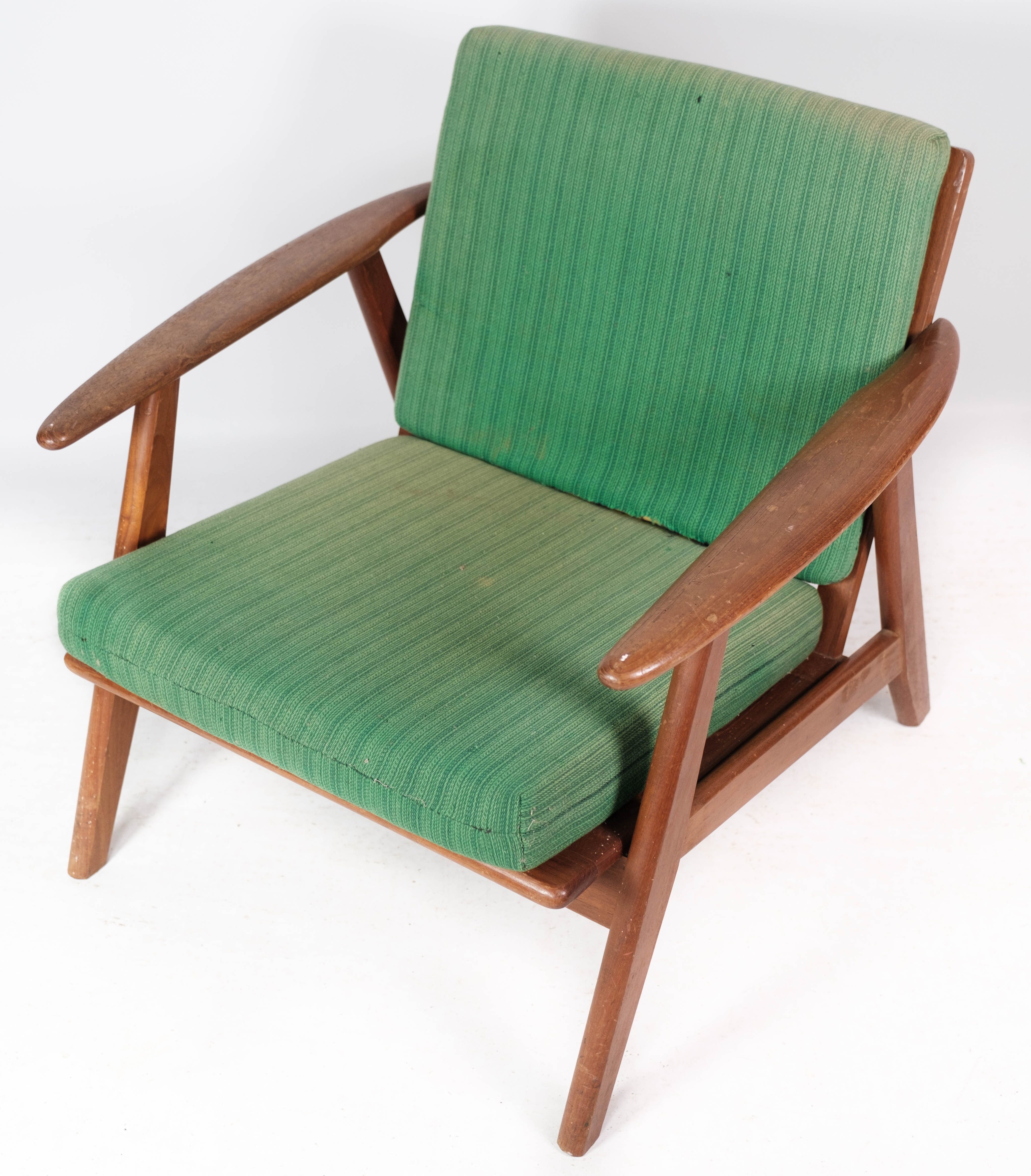 Easy chair in teak and with green upholstery of Danish design, 1960s