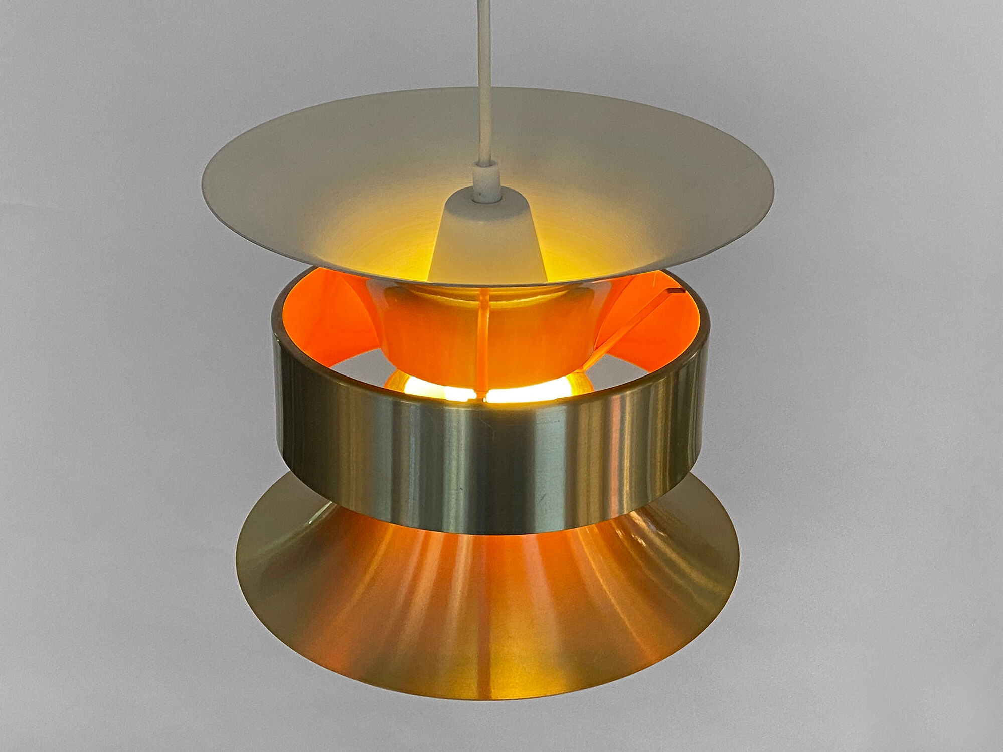 Pendant light in golden brushed aluminum by lyskaer belysning. denmark 1970s