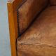 Sheep leather Art Deco design armchair combined with wood