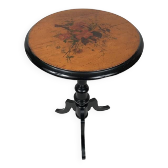 Black lacquered wood pedestal table and painted top decorated with flowers, late 19th century