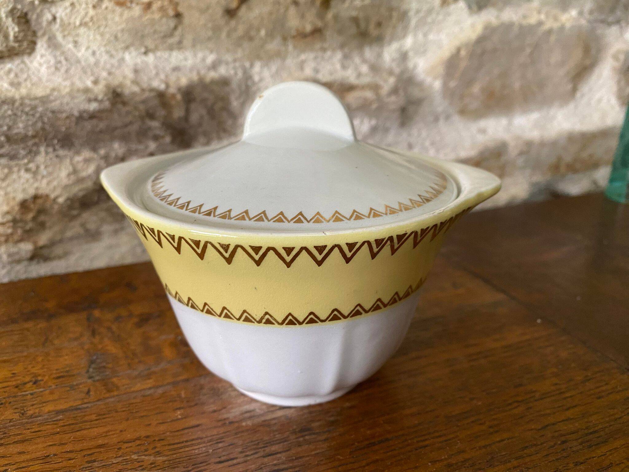 Sugar bowl or candy dish in white earthenware with yellow and gold frieze decoration