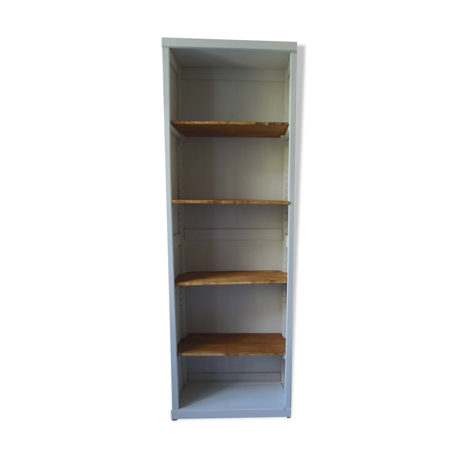 Shallow depth bookcase re-enchanted in pearl gray, wooden shelves.