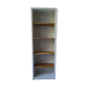 Shallow depth bookcase re-enchanted in pearl gray, wooden shelves.