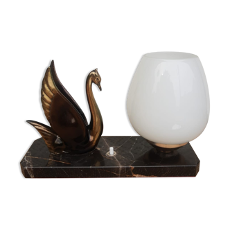 Art Deco swan and white globe table lamp with black marble base