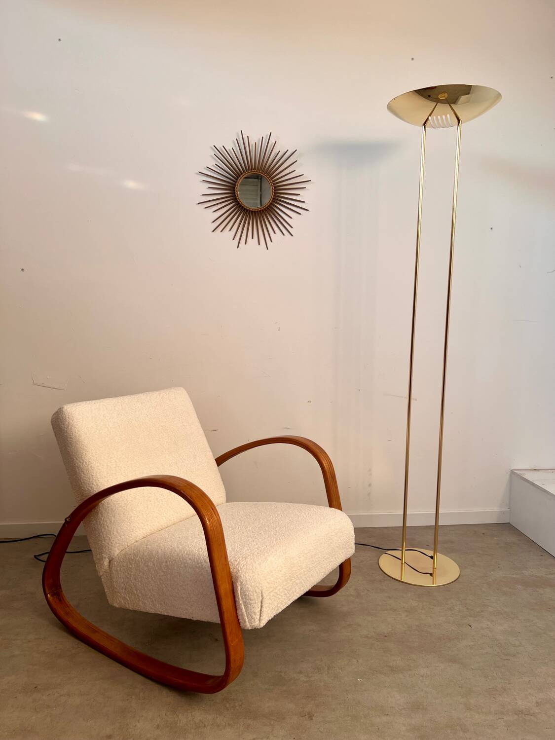 Old golden brass floor lamp with Italian design bulb from the 70s vintage