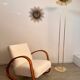 Old golden brass floor lamp with Italian design bulb from the 70s vintage