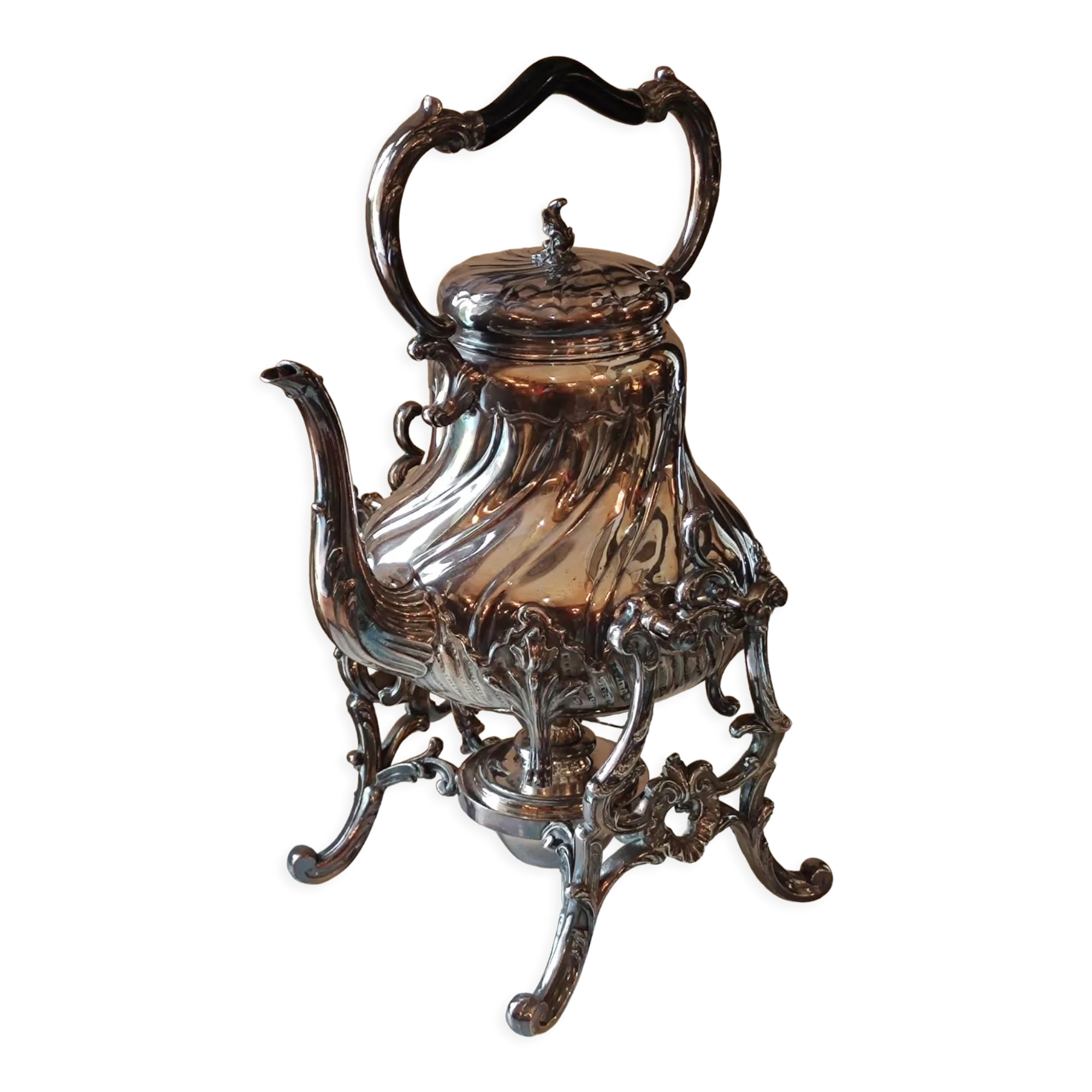 Ancient samovar tea fountain in silver metal