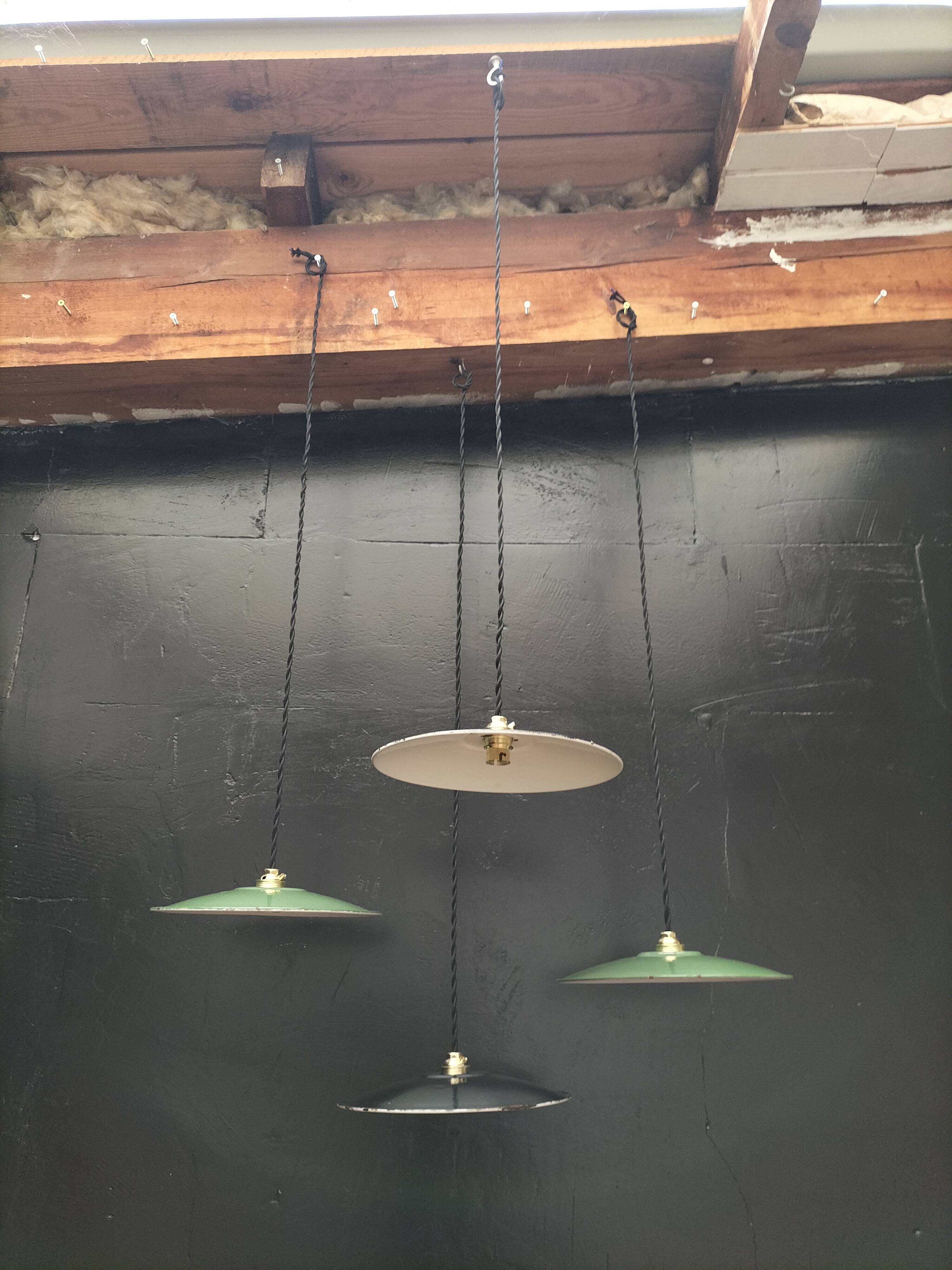 4 enameled sheet metal pendants