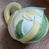 Jug in earthenware with banana decoration.