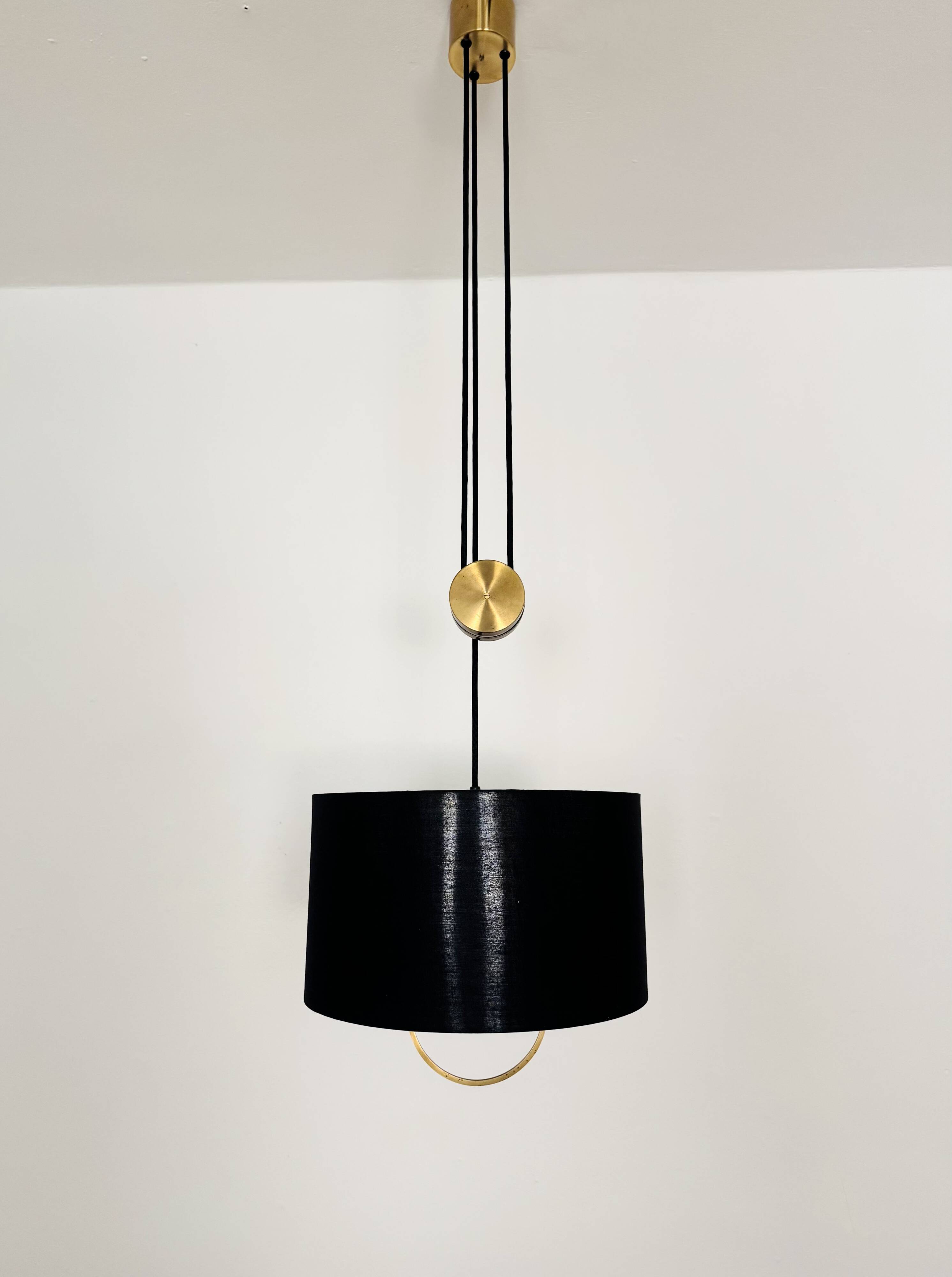 Lampe à pendentif Jo-Jo réglable par Florian Schulz