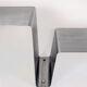Stainless steel coffee table and stool, by the Roche Bobois design office, 1970