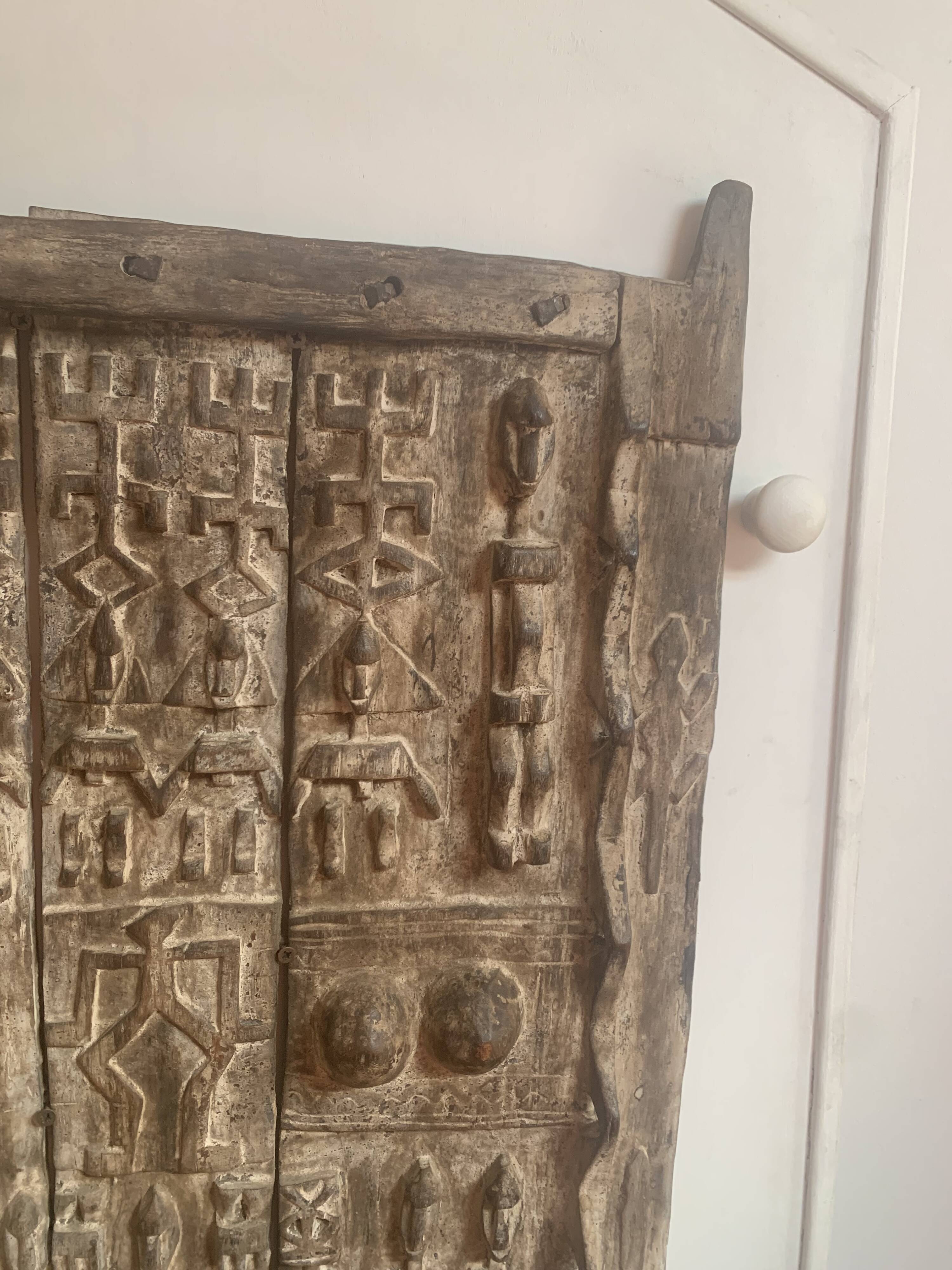 Old carved African door in solid wood – ethnic decoration – pi