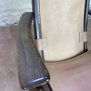 Colonial style leather armchair and ottoman