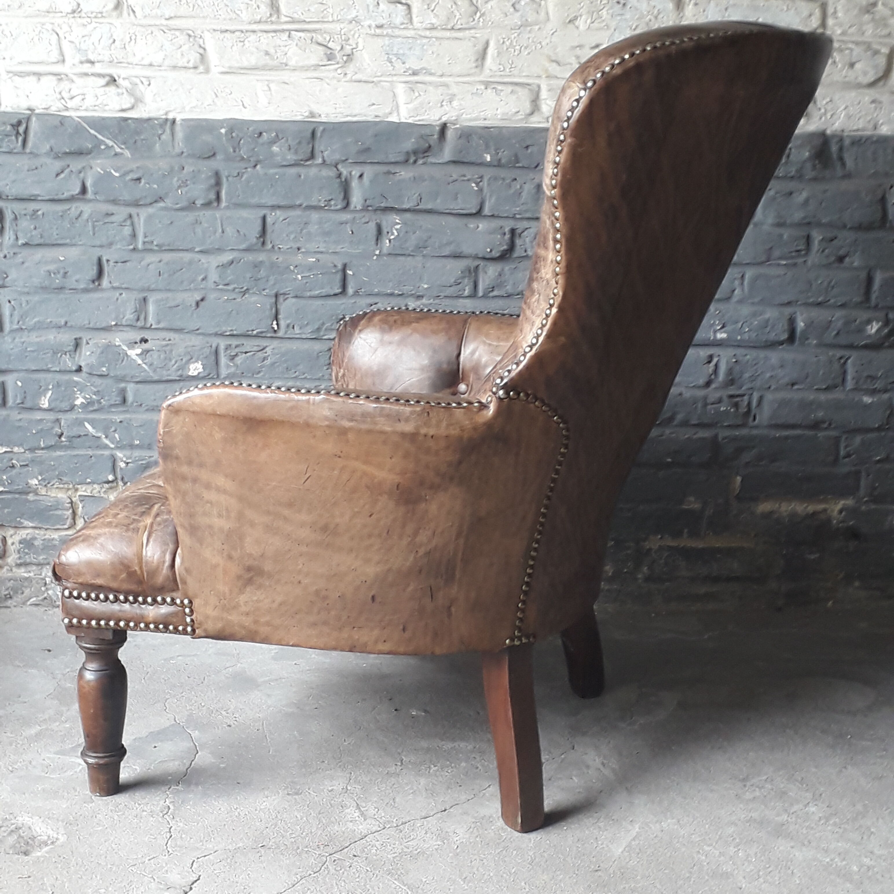 Antique Chesterfield armchair.