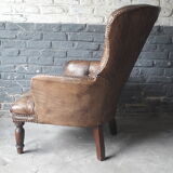 Antique Chesterfield armchair.