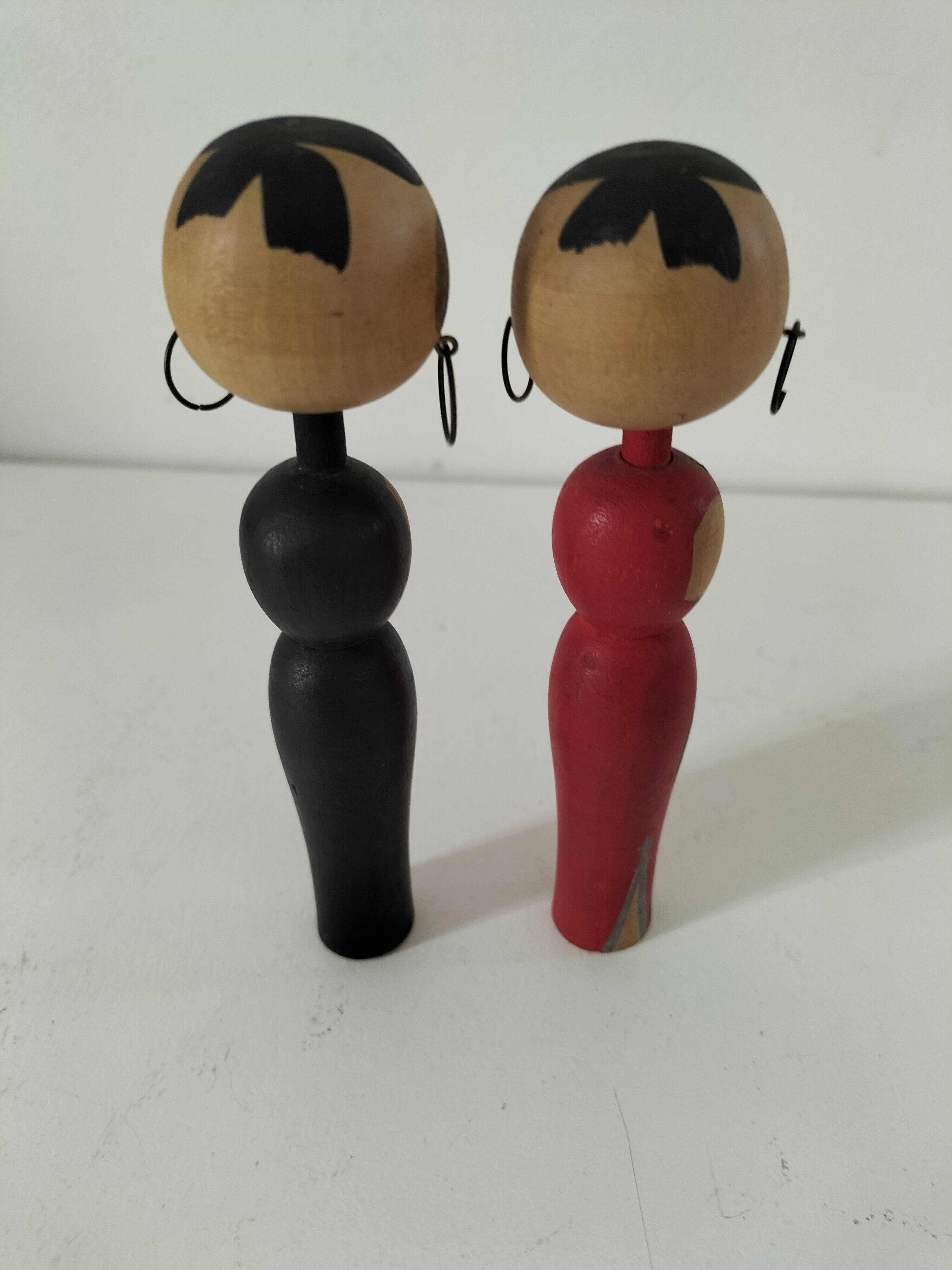 Pair of Japanese Kokeshi dolls - 1950s-1970s