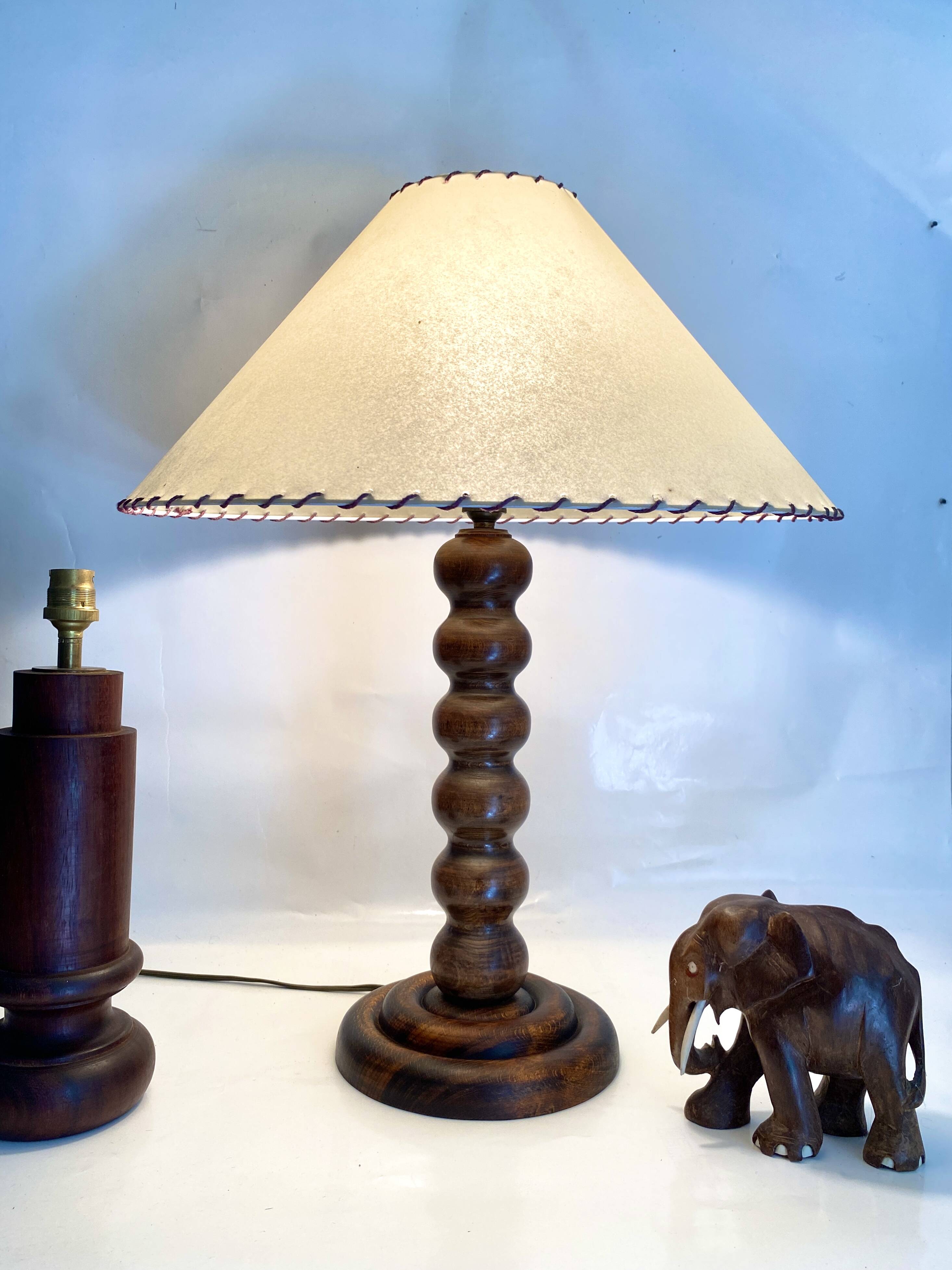 Turned wood lamp with paper shade