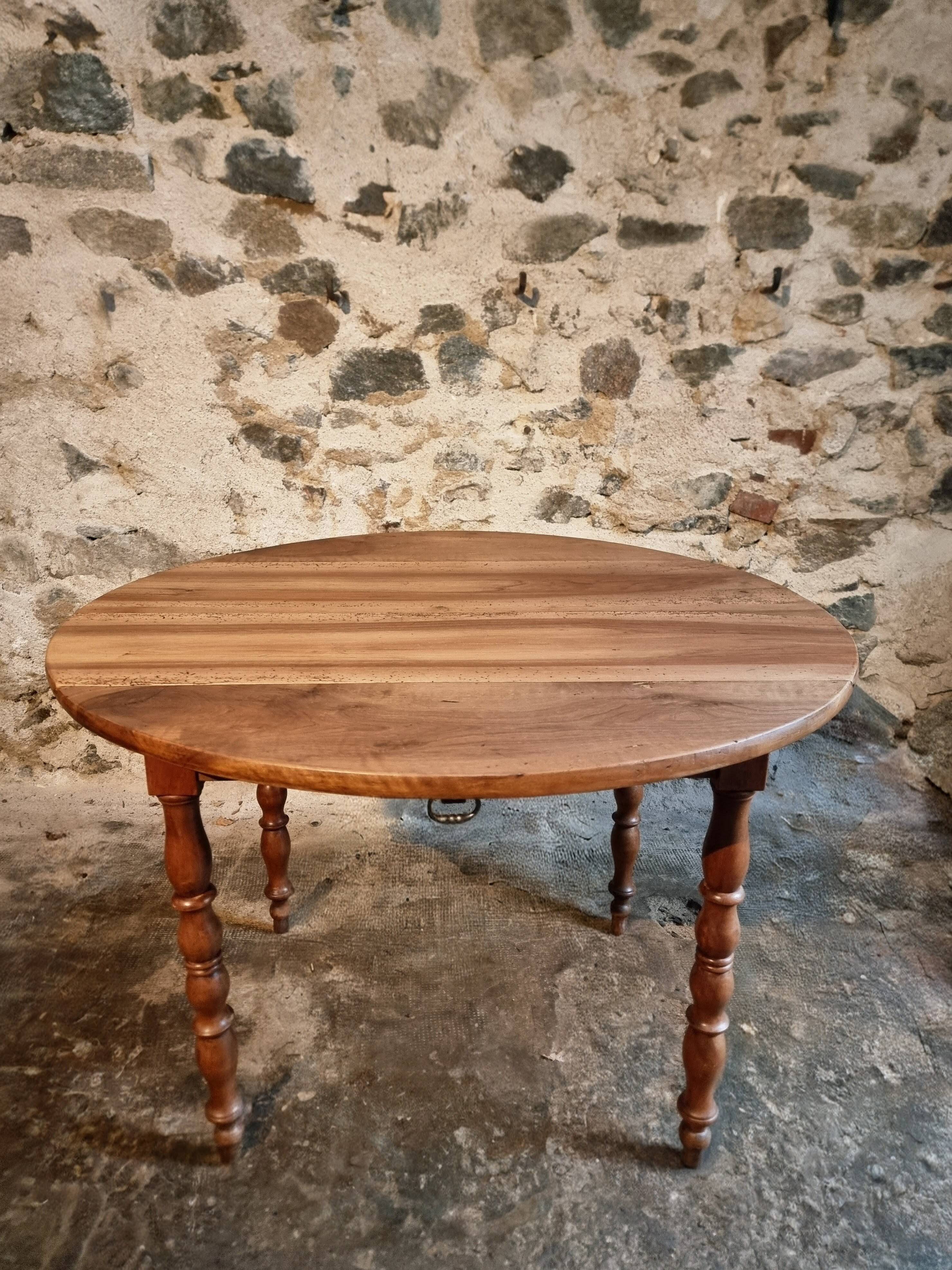 Antique walnut drop-leaf dining table – French round table 110 cm