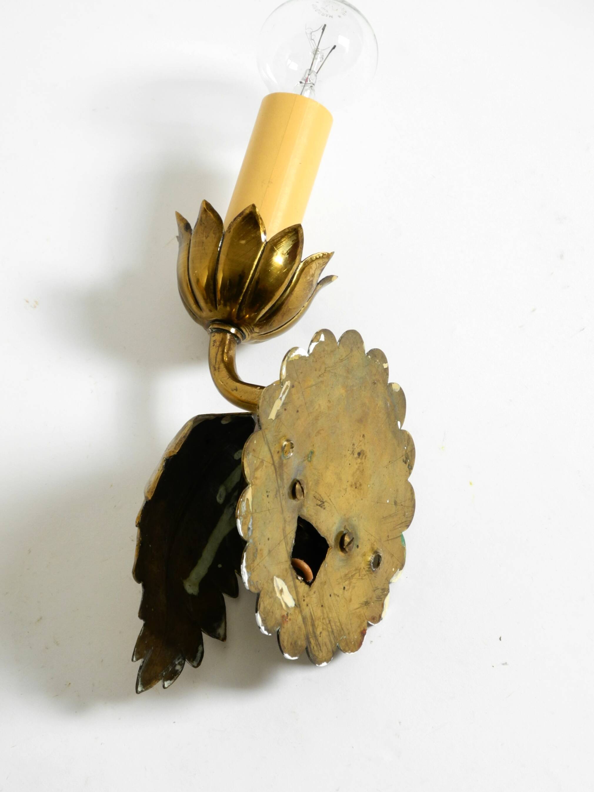 Two beautiful original Mid Century Modern floral wall lamps made of brass w