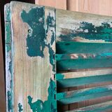 Old green shutter blinds